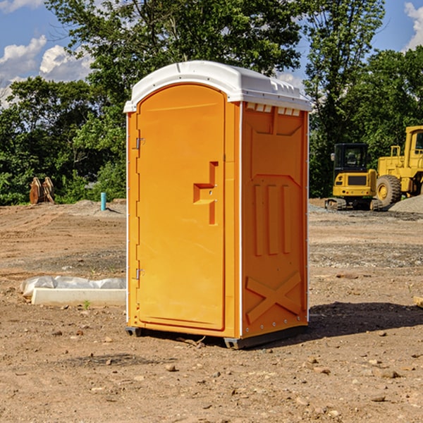 how often are the porta potties cleaned and serviced during a rental period in McClure